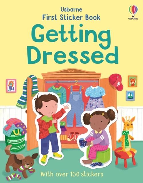 FIRST STICKER BOOK GETTING DRESSED